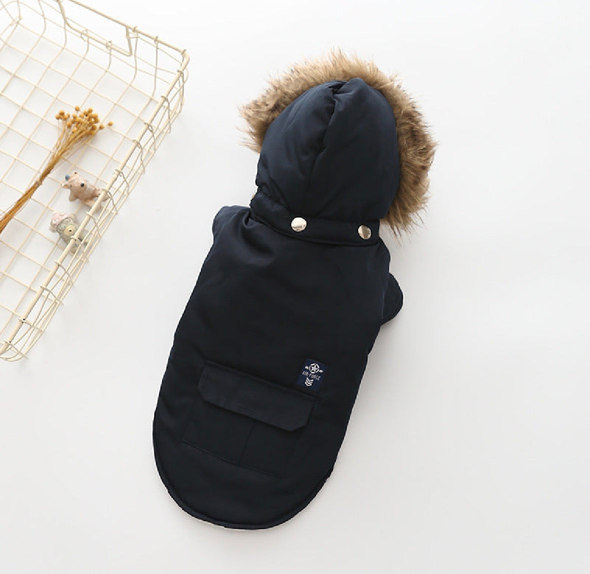 Hooded winter coat for dogs by JollyPaws, water-resistant with faux-fur trim
